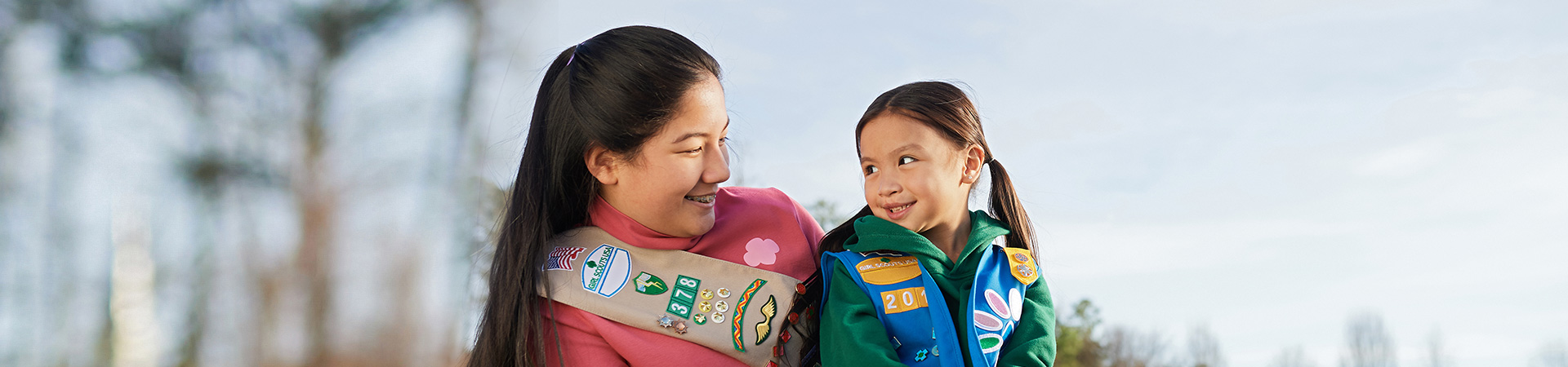  high school girl scout with daisy outside wearing uniforms 